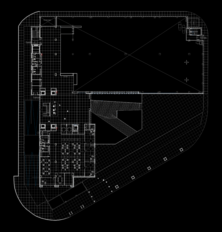 Ground floor CAD plan showing office furniture layout, vertical circulation, restrooms, and external gridded courtyard.