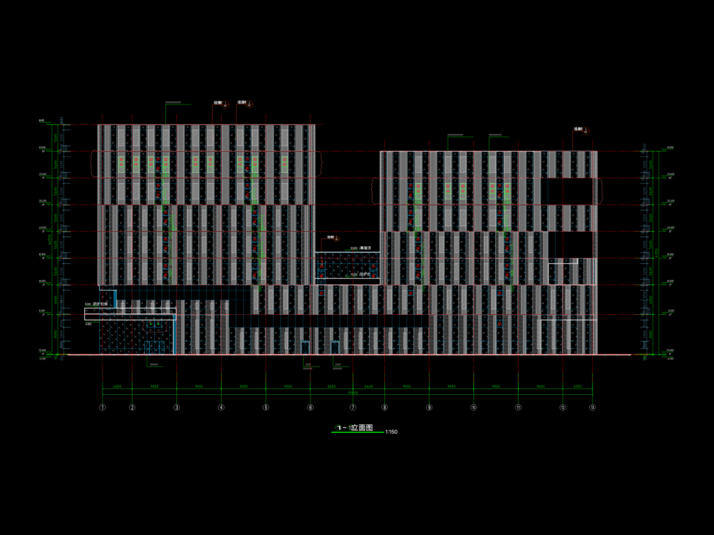 Multi-story factory building elevation drawing showing facade cladding, curtain wall details, and vertical floor levels.