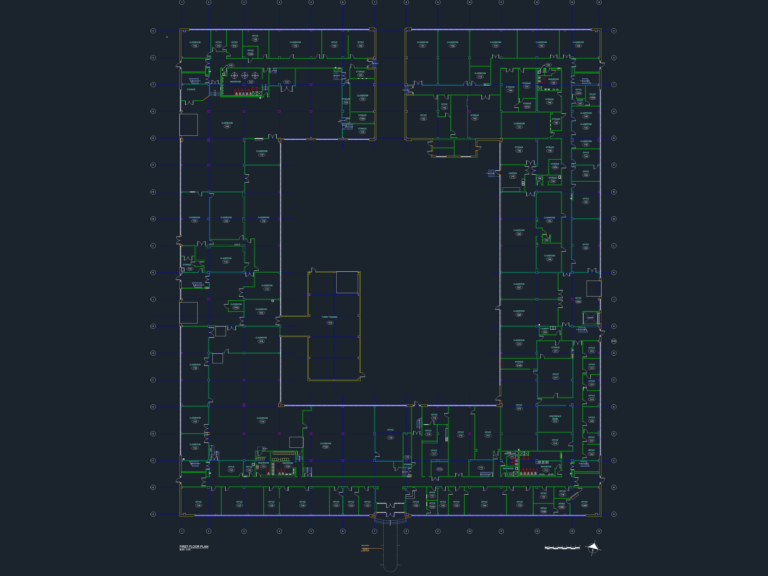 2D architectural first floor plan of a courtyard-style school building featuring classrooms and structural grid.