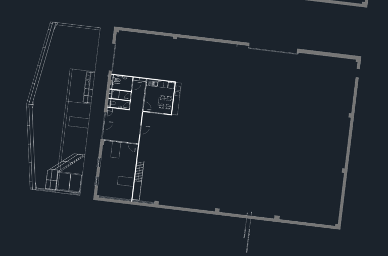 CAD floor plan of an industrial warehouse unit showing office partitions, staircase, and MEP service entrance locations.
