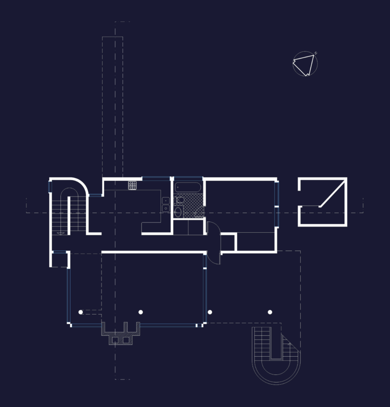 Architectural floor plan of the Smith House lower level showing kitchen, bath, bedroom, and stairs layout.