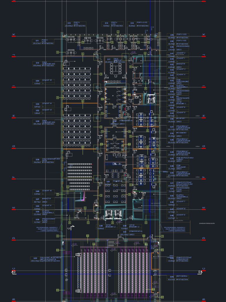 Architectural floor plan showing an auditorium seating area, elevator shafts, and corridor layout.