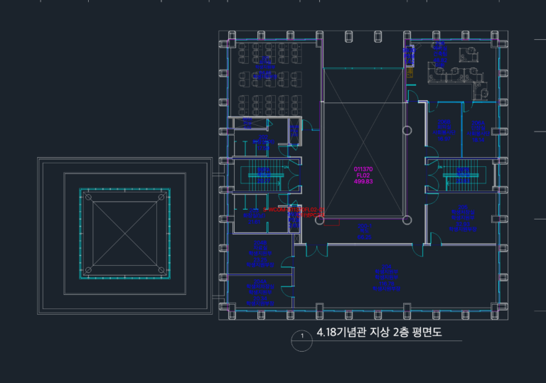 2F architectural floor plan for the 4.18 Memorial Hall featuring office layouts, stairs, and a central atrium void.