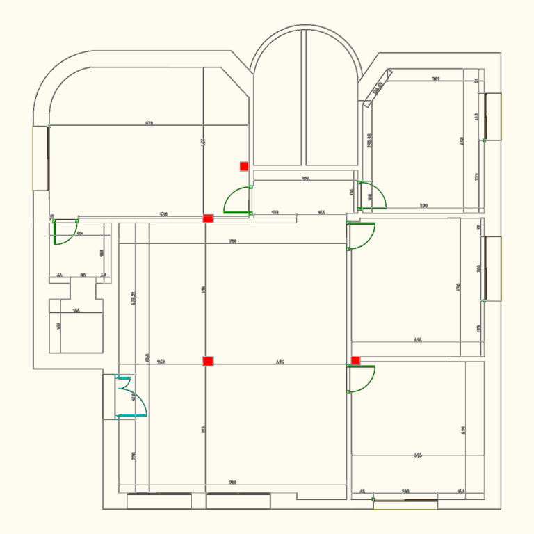 2D apartment floor plan CAD drawing showing room dimensions, door swings, and red structural columns.