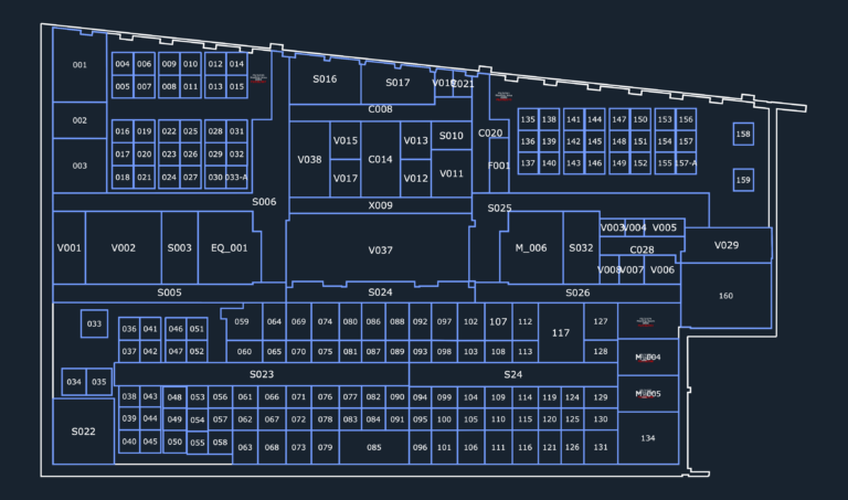 2D CAD floor plan of a large office layout with numbered workstations, office zones, and equipment blocks.