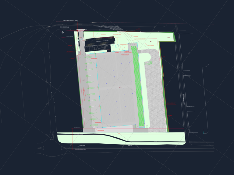 CAD site plan layout of an industrial logistics terminal showing loading docks, rail access, and vehicle maneuver areas.