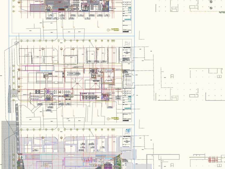 CAD floor plans for a medical and community center featuring architectural layouts, grid lines, and room annotations.