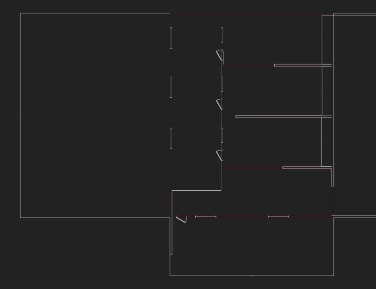 2D CAD floor plan showing a small residential layout with wall lines, door swings, and window blocks.
