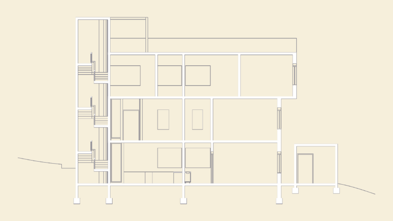 Building section of the Smith House showing the interior stairwell, floor levels, and foundation footings.