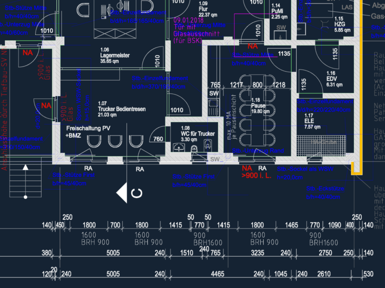 Detailed architectural CAD floor plan of a warehouse showing office layouts, structural columns, and foundation details.