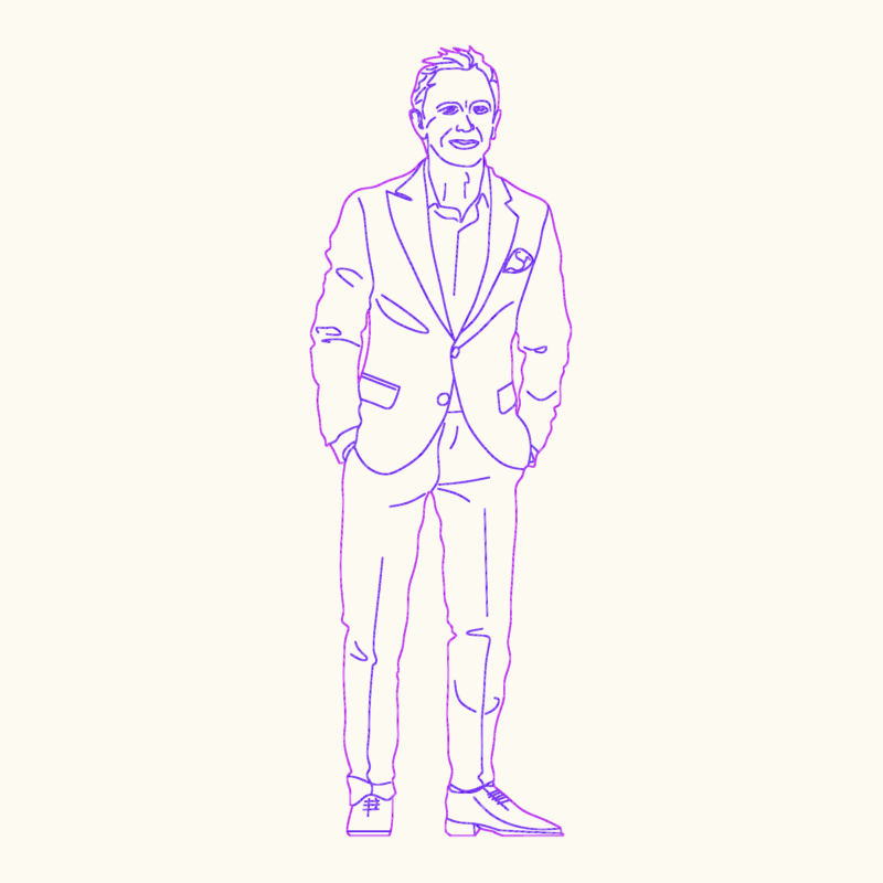 London Style Man in Suit Standing with Hands in Pockets