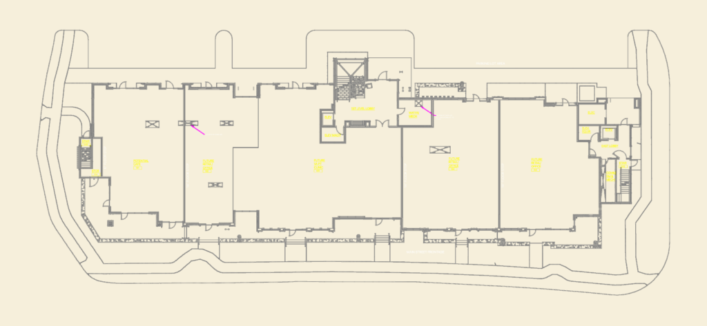 CAD floor plan of the Alpine Building first level showing retail, office, cafe, and lobby areas.
