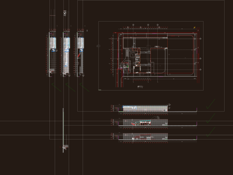 CAD layout of an industrial factory site showing entrance details, rolling shutters, and drainage plans.