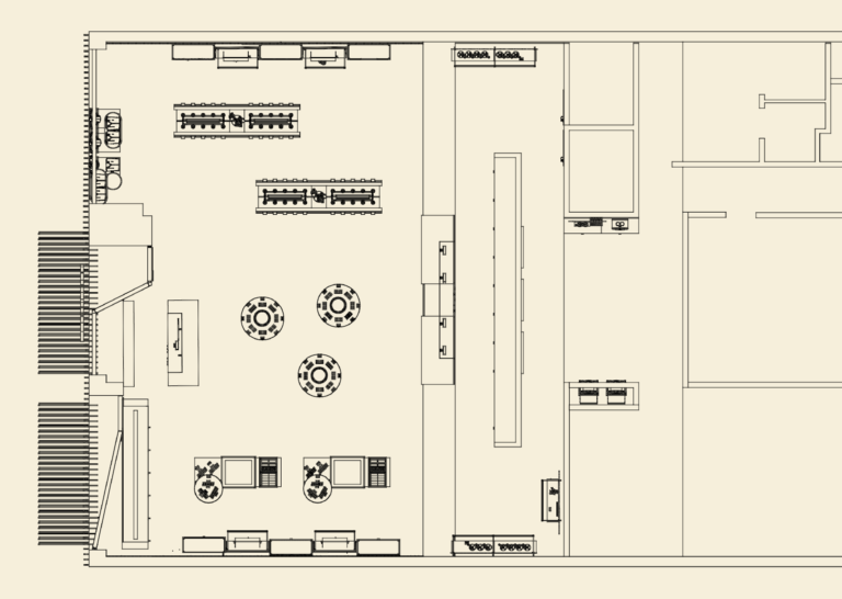 Overhead view of a retail floor plan with display tables, counters, and entrance security pedestals.