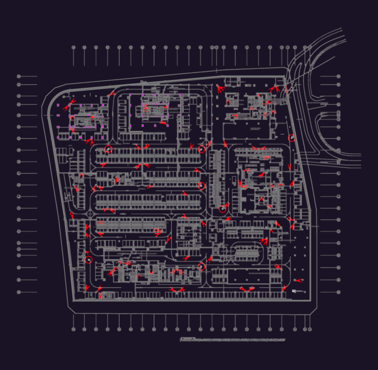 Detailed CAD floor plan of an underground basement level showing parking stalls, ramps, and elevator cores.
