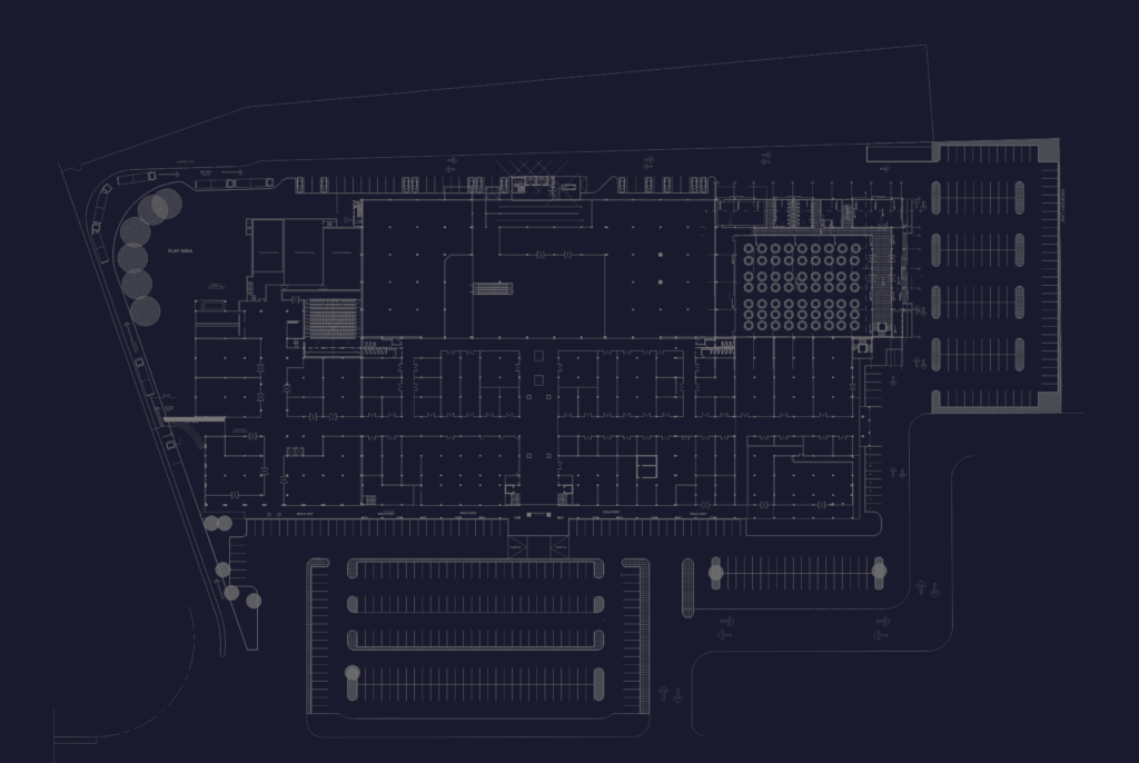 Architectural site plan of a shopping mall with supermarket anchor, department stores, and large parking area.