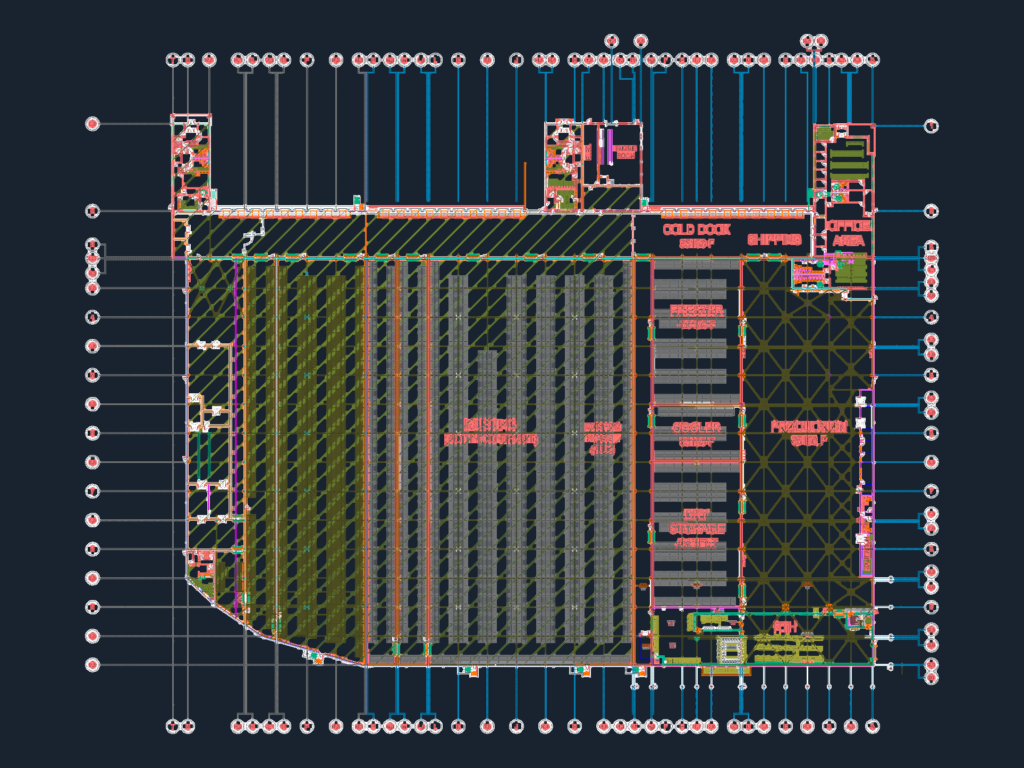 Detailed CAD floor plan of an industrial facility showing cold storage, freezer rooms, and production areas on a grid.