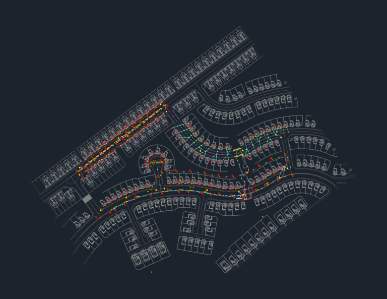 Technical layout of a main sewage network showing manhole positions, pipe connections, and invert levels.