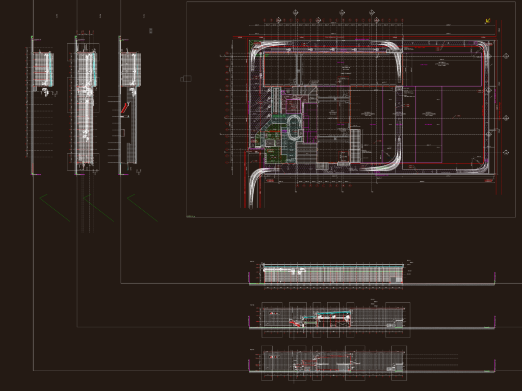 Architectural factory site plan and building sections with overhead crane details.
