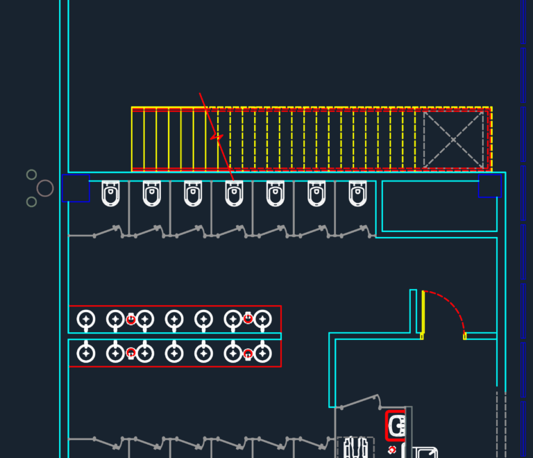 2D CAD floor plan showing warehouse area, detailed restrooms, and service rooms.