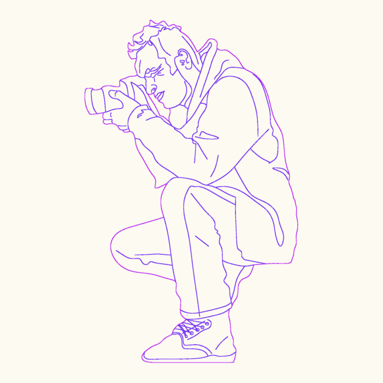 Outline drawing of a man in a hoodie crouching while holding a camera to his eye.