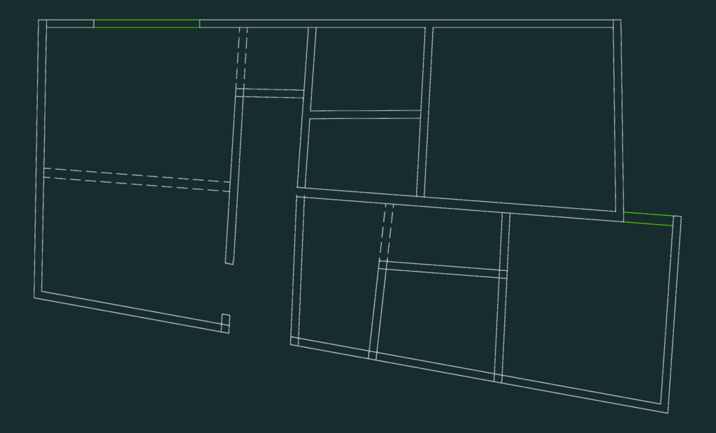 2D CAD floor plan showing wall outlines and window positions for a small apartment.