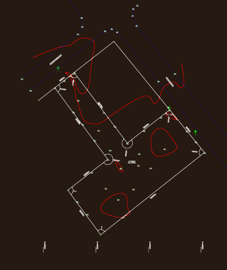 Technical topographic survey drawing showing property boundaries, angles, and elevation spot levels on a site plan.