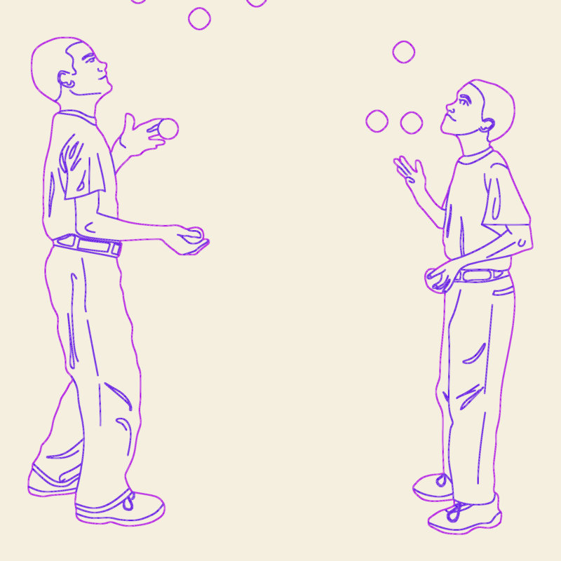Two jugglers juggling