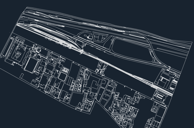 Detailed CAD urban layout with building footprints, roads, and a complex highway interchange.