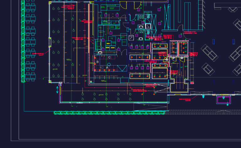 Detailed CAD drawing of a restaurant floor plan showing kitchen appliances, dining area, and restroom elevations.