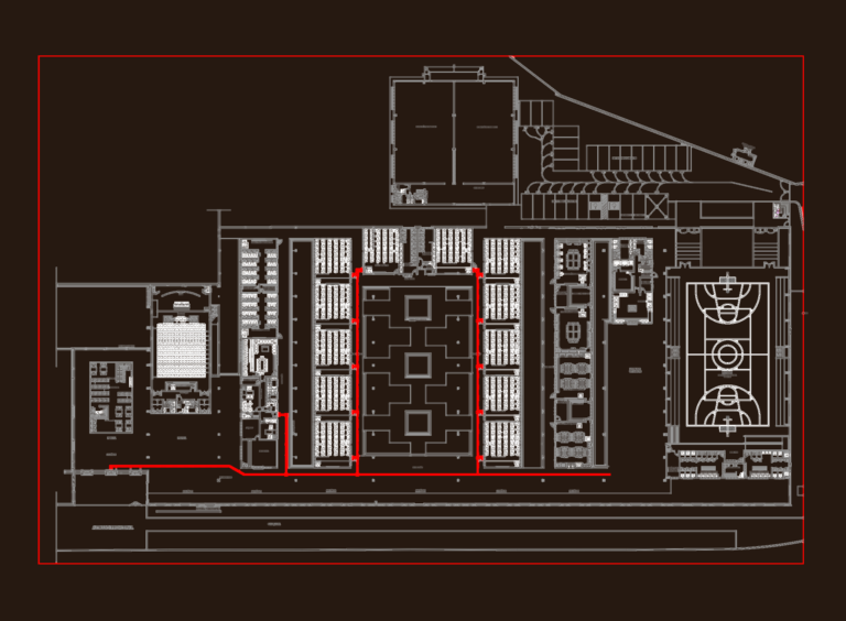 Detailed architectural floor plan of a professional school complex with an auditorium and sports court.